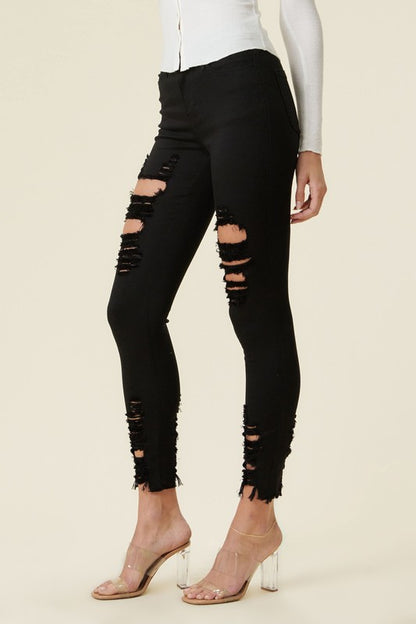 High Rise Distressed Skinny Jeans with a Raw Hem