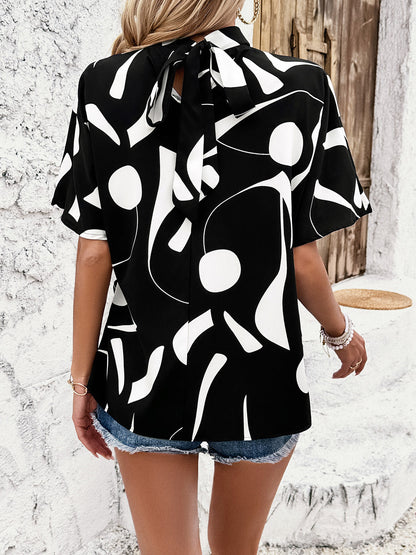 Tied Printed Mock Neck Half Sleeve Blouse