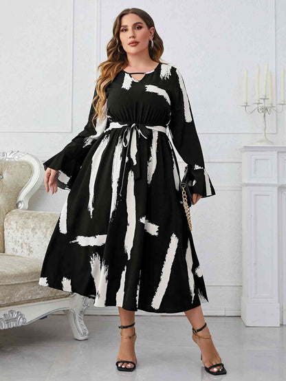 Melo Apparel Plus Size Printed Tie Belt Flare Sleeve Round Neck Midi Dress